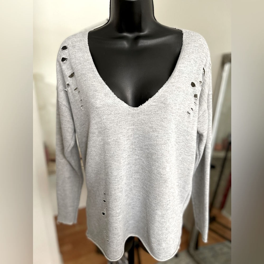 Distressed grey sweater